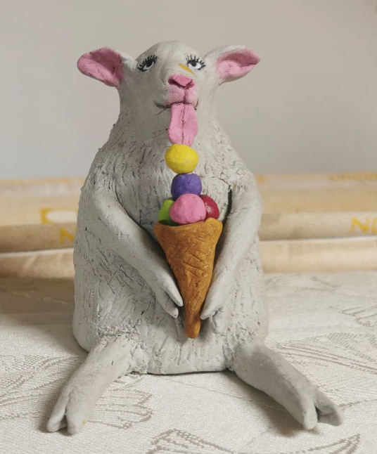 Lamb licking icecream cones